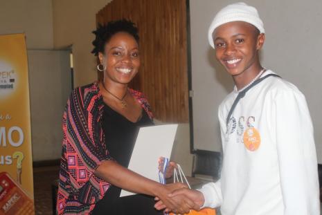 Nairobi Student receiving certificate during the 13 edition of KAPEK maths Olympiad 